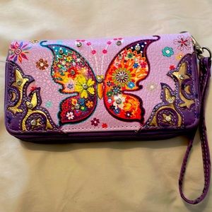 NWOT beautiful wrist wallet with colorful butterflies and flowers.